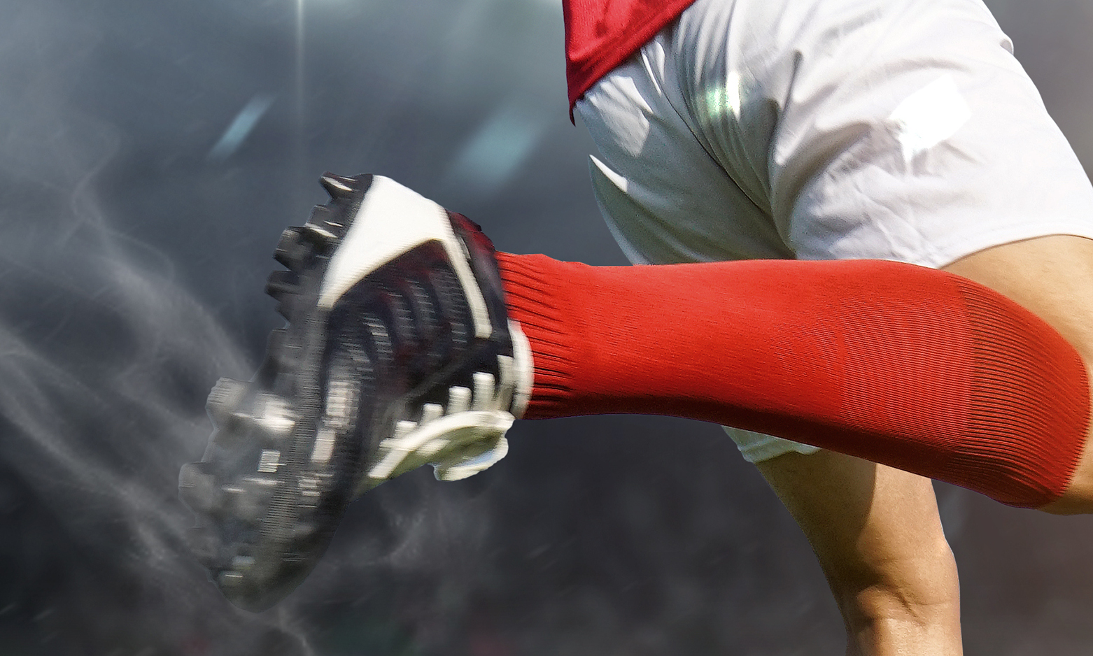 Football player in the stadium